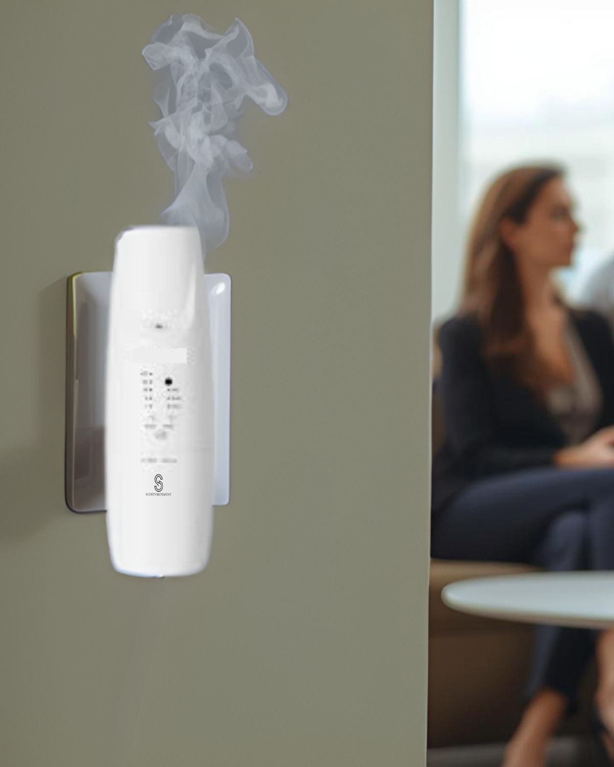 Electric commercial scent diffuser installed in a hospitality environment.